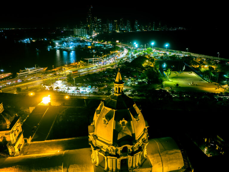 Domed church by the water at night, aerial | Matthew Hoyos
