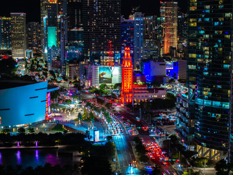 Freedom Tower and downtown Miami at night, aerial | Matthew Hoyos