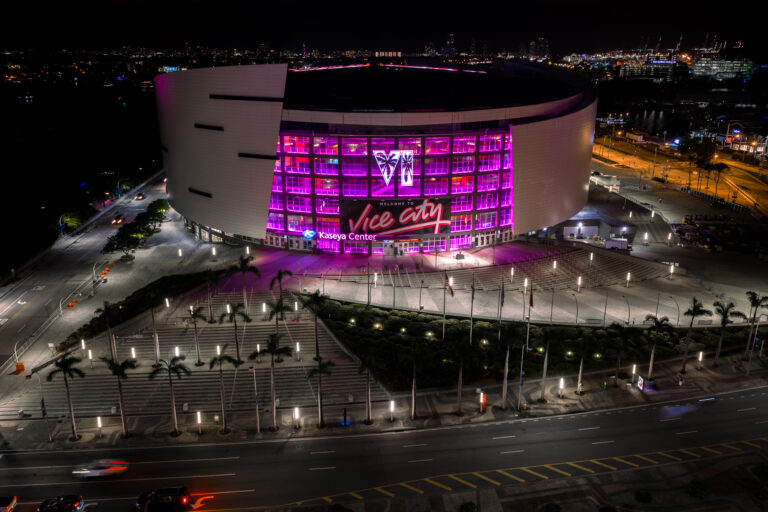 Kaseya Center lit up at night, downtown Miami, aerial | Matthew Hoyos